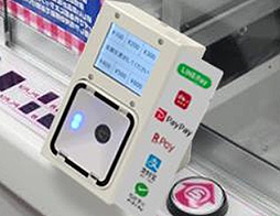 画像ギャラリー No.002のサムネイル画像 / タイトー,業務用ゲーム機に取り付けるスマホ(コード)マルチペイメント決済システムの導入実験に,2月より参画